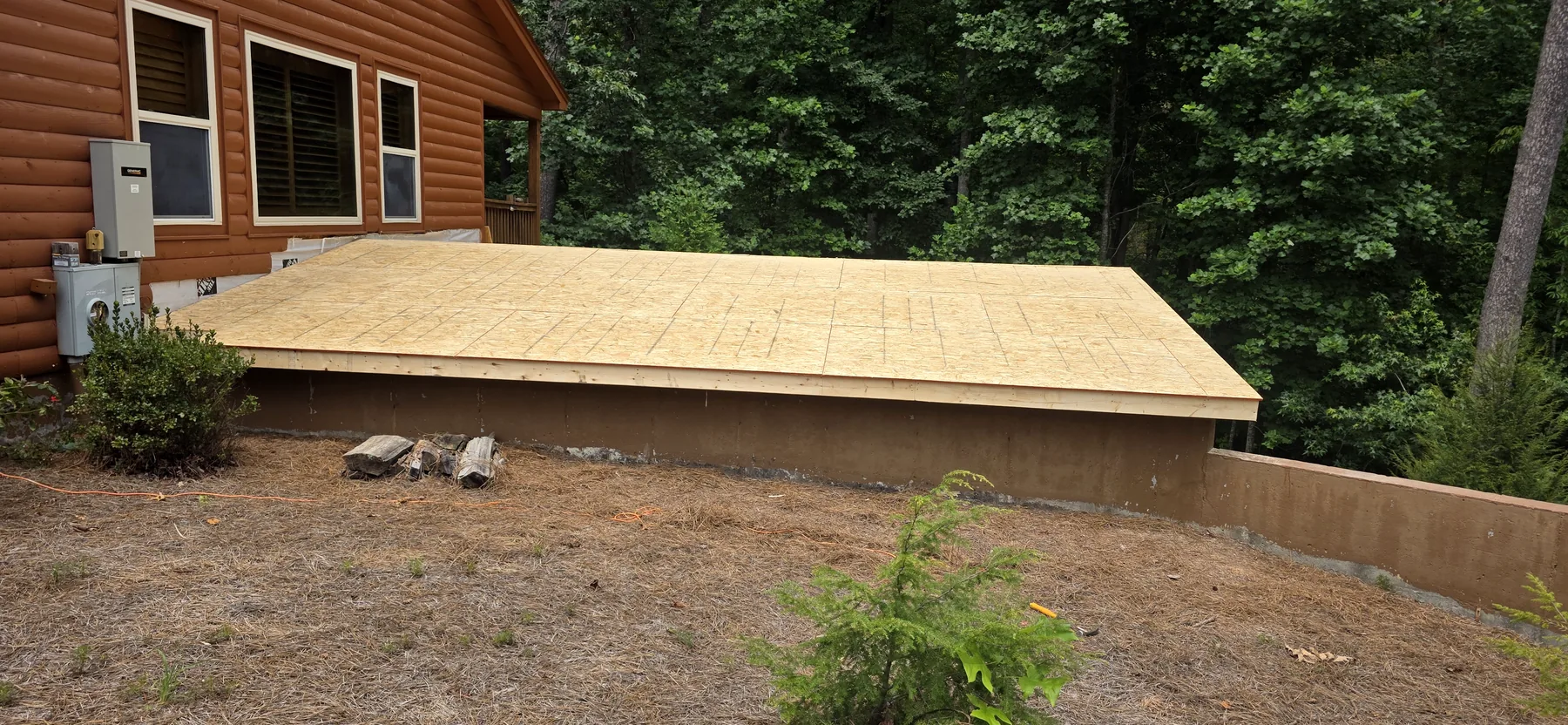 Roof sheathing installed on the custom attached storage addition